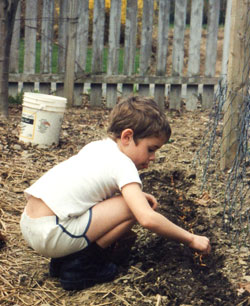 Our son helping in the garden